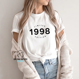 May include: White t-shirt with black text that reads "Limited Edition 1998".