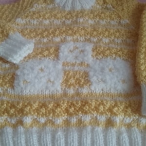 Hand knitted, little patterned jumper.Size, 6-12 months.
