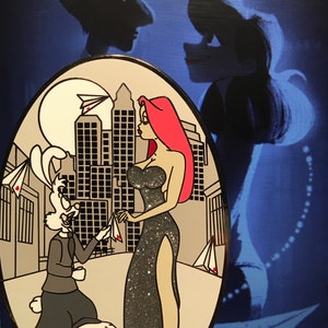 May include: A cartoon pin featuring a rabbit in a tuxedo holding a paper airplane and a woman in a black sequined dress with red hair. The background is a cityscape with a moon and clouds.