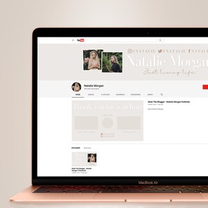 Puede incluir: Una captura de pantalla de una p&aacute;gina de canal de YouTube para Natalie Morgan. El canal tiene 500.000 suscriptores y presenta una foto de Natalie en un entorno floral. El texto "Just living life" se muestra en una fuente estilizada. El canal presenta videos, listas de reproducci&oacute;n y una secci&oacute;n de discusi&oacute;n.