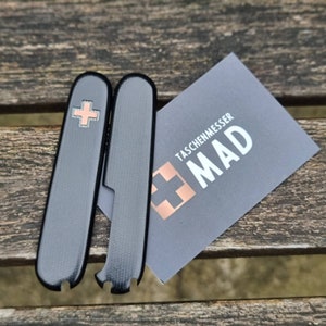 Black Micarta Scales. Copper effect cross for Victorinox 91mm Swiss Army Knife