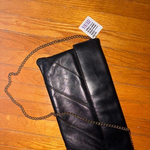 Cartera vintage de piel auténtica negra con cadena