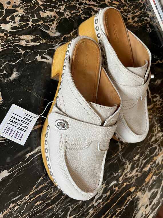 Coach turnlock clogs best sale
