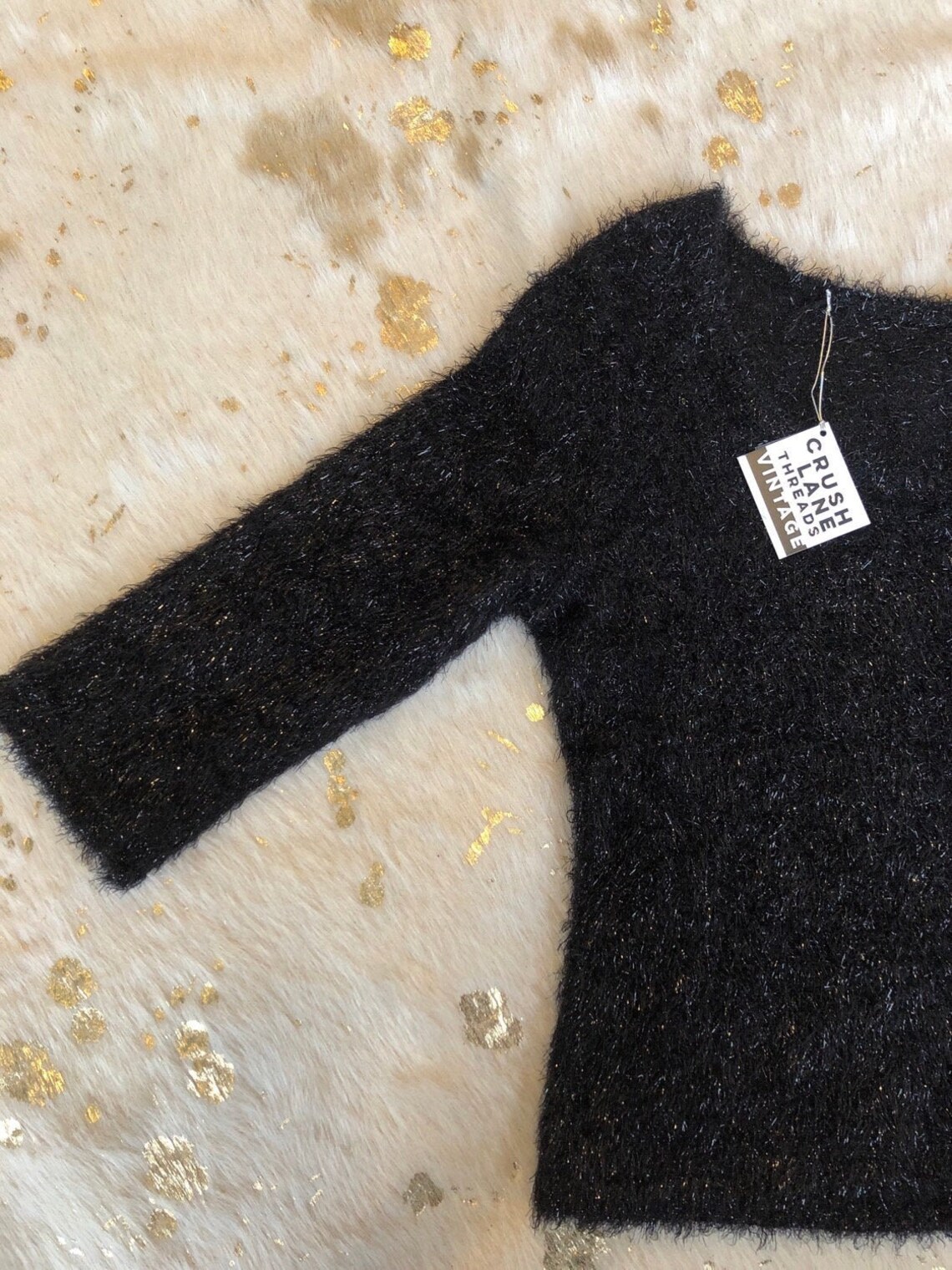 black sparkly sweater