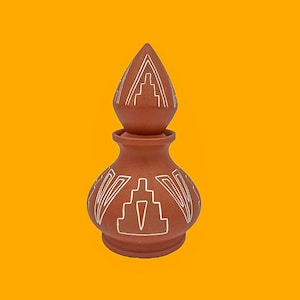 May include: A terracotta-coloured ceramic jar with a matching conical lid. The jar and lid are decorated with white geometric designs. The jar has a rounded body and a narrow neck. The background is a solid yellow colour.