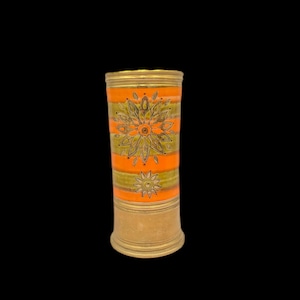 May include: A cylindrical vase with a brass base and rim, featuring a vibrant design. The vase is adorned with horizontal orange and olive green stripes, and floral patterns. The vase is approximately 20 cm tall.