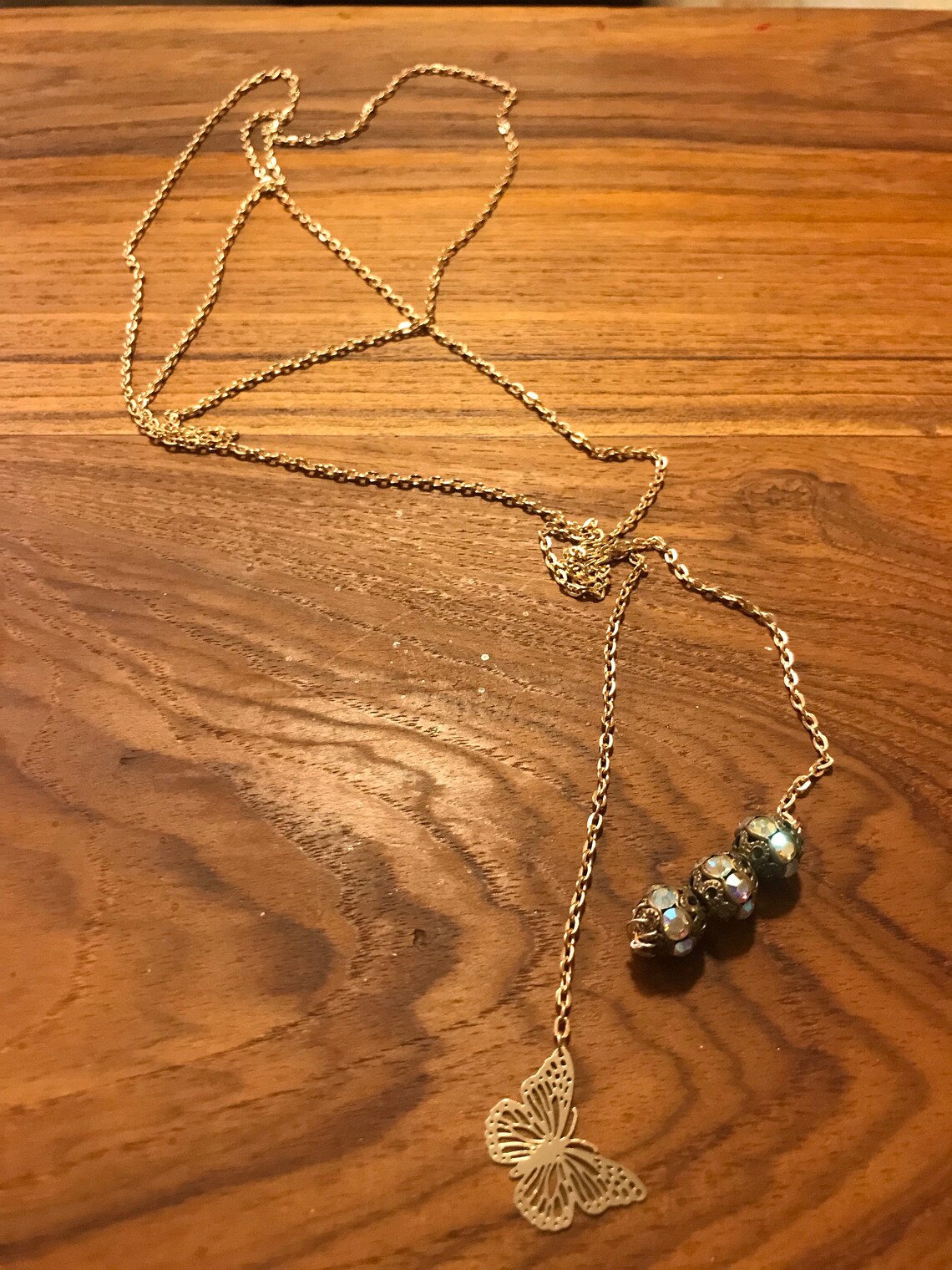 Gold lightweight bolo style necklace gems and gold butterfly Etsy