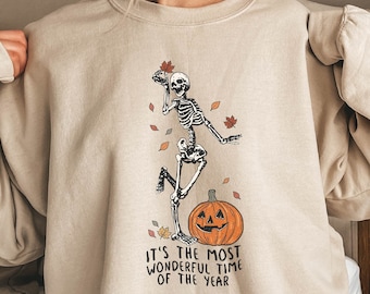 ダンシングスケルトンスウェットシャツ - 不気味な季節にぴったりのハロウィンパーカー