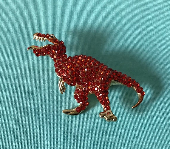 Dinosaur brooch outlet
