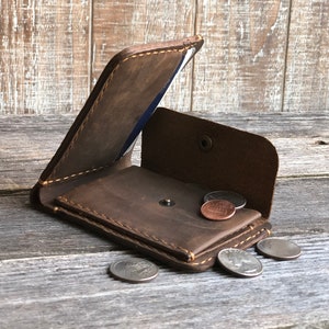 Mens Wallet with Coin Pocket. The Men’s coin wallet in the picture. Coin pocket with snap closure is inside on the right flap.