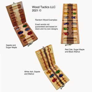 May include: Three wooden game boards with different wood types and coloured glass game pieces. The boards are open and show the inside of the game. The text on the image reads "Wood Tactics LLC 2021 &copy; Random Wood Examples: Exact woods not guaranteed and based on stock and my own designs".