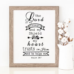 May include: Black and white printable wall art with a religious quote: "The Lord is my strength and my shield, my heart trusts in Him and he helps me. Psalm 28:7"