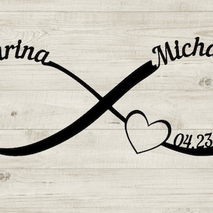 May include: Black infinity symbol with the names "Karina" and "Michael" on either side. A heart is in the center of the symbol with the date "04.23.2023" below it.