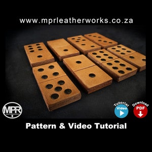 May include: A set of nine leather dominoes with black dots on a brown background. The dominoes are arranged in a staggered pattern. The image includes the text "www.mprleatherworks.co.za".