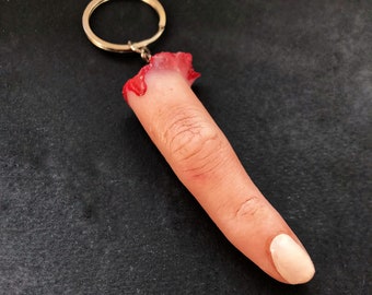 Severed silicone finger prop keyring