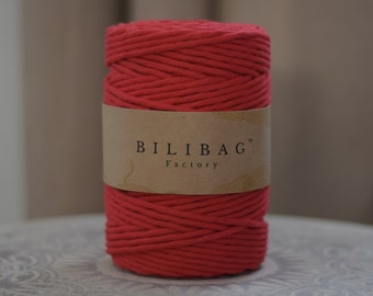 May include: A spool of bright red cotton cord, labeled "BILIBAG™ Factory".