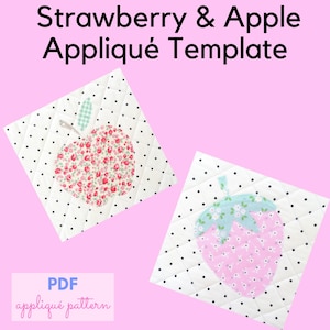 May include: Two quilted fabric squares with appliqued fruit designs. One features a red floral apple, the other a pink strawberry with a green and blue floral top. The text "Strawberry & Apple Appliqué Template" is at the top.