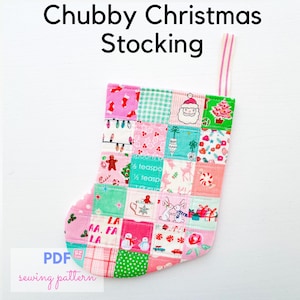 May include: A patchwork Christmas stocking with a pink and green color scheme. The stocking is made of various fabric squares with holiday-themed patterns, including Santa Claus, Christmas trees, and gingerbread men. The text "Chubby Christmas Stocking" and "PDF sewing pattern" are visible.