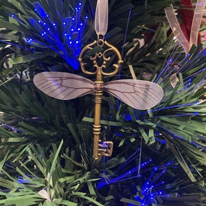 Flying key inspired ornament
