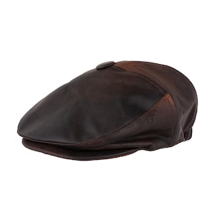 May include: A brown leather newsboy cap with a button on top.