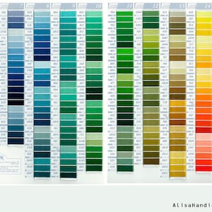 May include: A color chart with 10 rows of 15 small squares of thread, each square containing a different color. The colors range from blue to green to brown to orange to red. The chart is labeled with numbers 6 through 15.