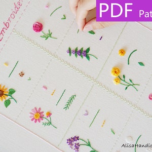 Puede incluir: Un patrón PDF para bordado con una variedad de diseños florales, incluyendo girasoles, rosas y margaritas. El patrón incluye instrucciones para bordar cada flor y hoja.