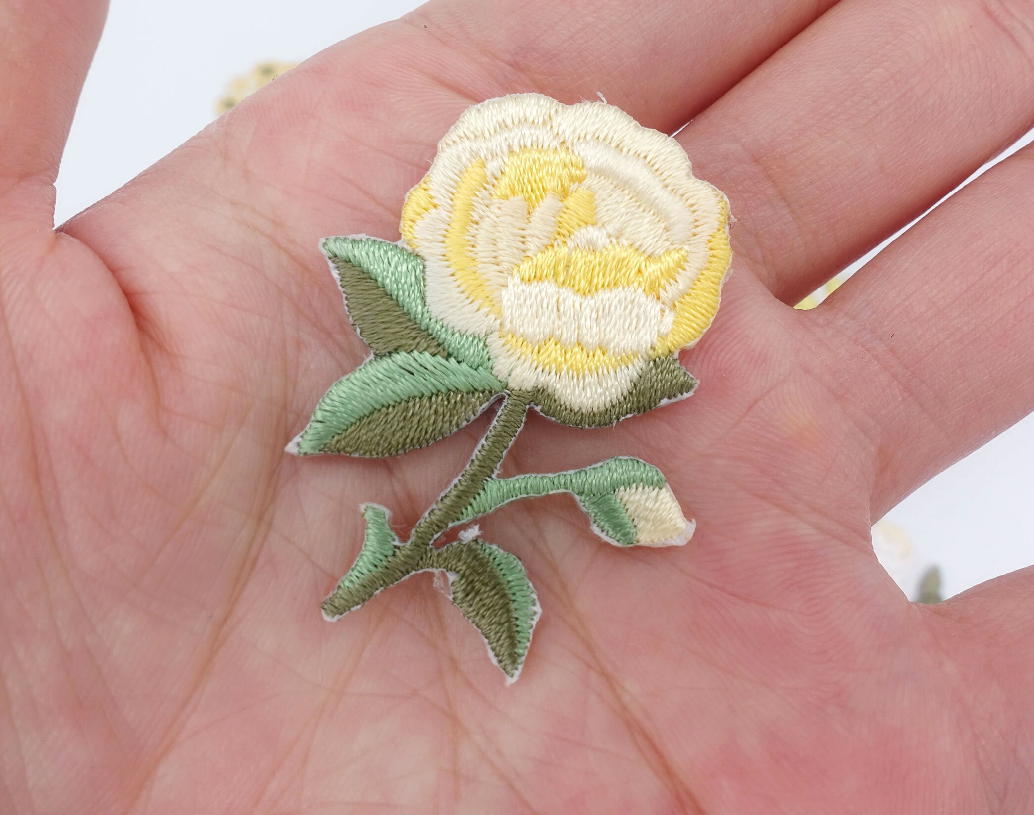 thumbnail interactive-video image 1 of Pair Of Flower Patches – Iron On/Sew On Floral Embroidery Badges (Made In UK) 1 of 6