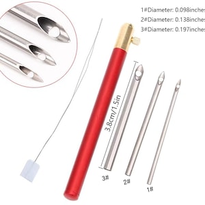 May include: Set of three red-handled needle threaders with different sized needles. The needles are labeled 1, 2, and 3. The threader is 3.8 cm or 1.5 inches long. 1#Diameter: 0.098inches/ 2.5mm, 2#Diameter: 0.138inches/ 3.5mm, 3#Diameter: 0.197inches/5mm