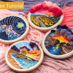 May include: Four embroidery hoops featuring various landscape scenes, including a mountain range, a city skyline, a beach scene, and a wall with flowers. The hoops are surrounded by pink and purple yarn.