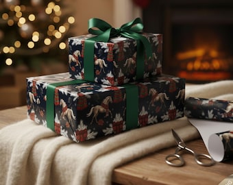 May include: Two wrapped gifts with dark blue paper featuring a horse and holiday pattern, tied with green ribbon. The gifts are stacked on a wooden table with a white blanket. A pair of scissors and a roll of wrapping paper are nearby.