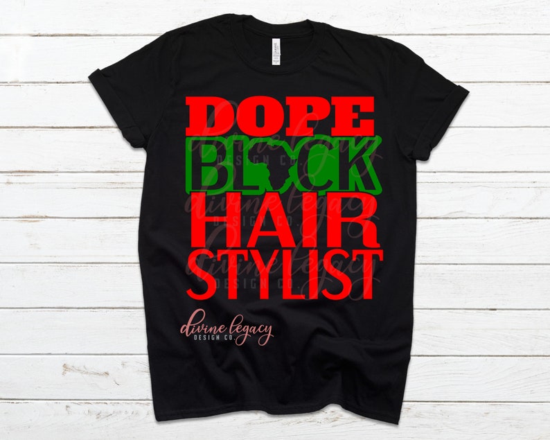 May include: Black t-shirt with red and green text that reads "Dope Block Hair Stylist".