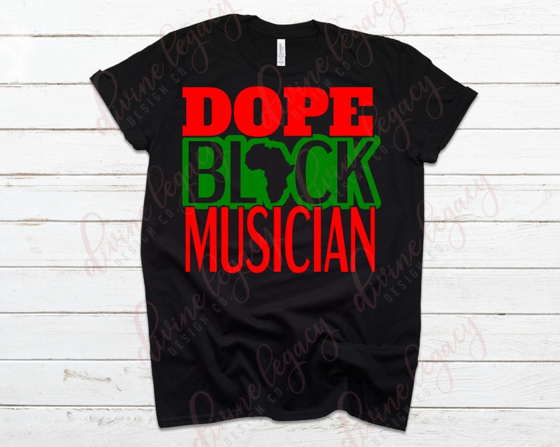 May include: Black t-shirt with the text "Dope Black Musician" in red and green letters. The word "Black" includes a green outline of the continent of Africa.