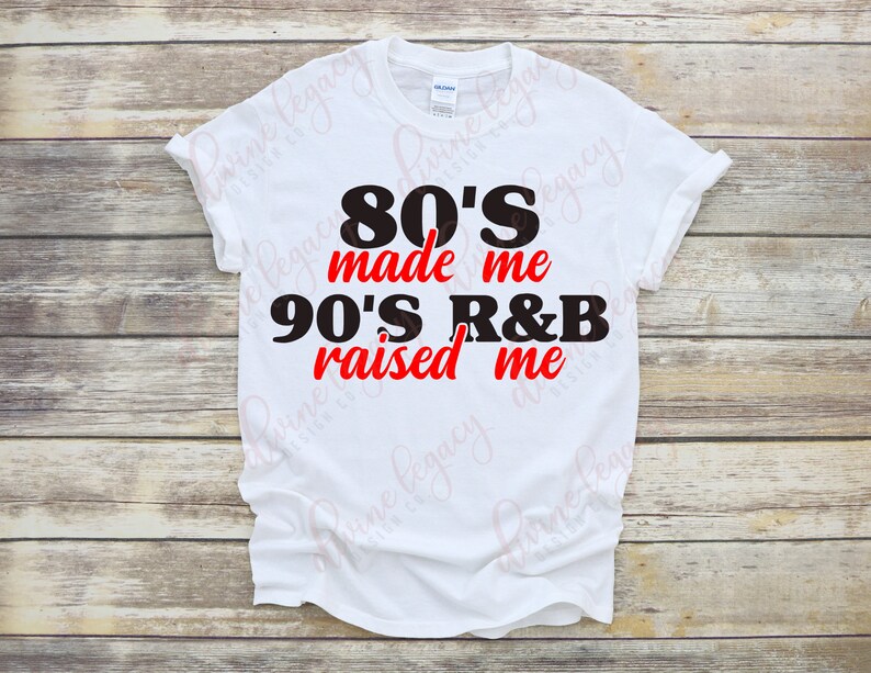 May include: White t-shirt with black text that reads "80'S made me 90'S R&B raised me" in red.