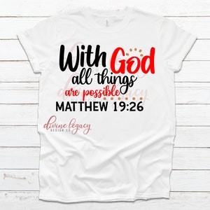 May include: White t-shirt with black and red text that reads "With God all things are possible Matthew 19:26". The text is surrounded by small brown dots.