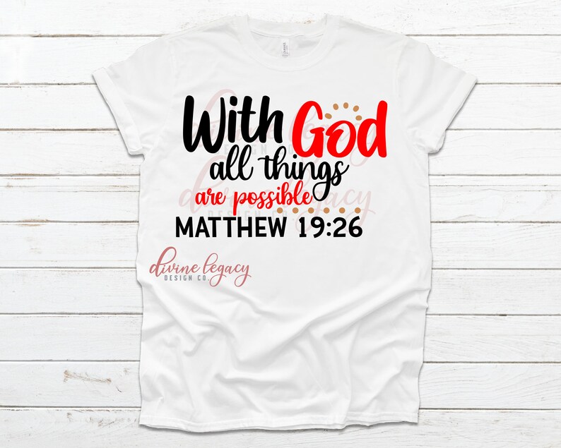 May include: White t-shirt with black and red text that reads "With God all things are possible Matthew 19:26". The text is surrounded by small brown dots.