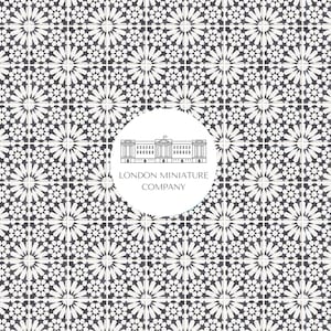 May include: A black and white geometric pattern tile with a white circle in the centre. The circle contains a line drawing of a building and the text "LONDON MINIATURE COMPANY".