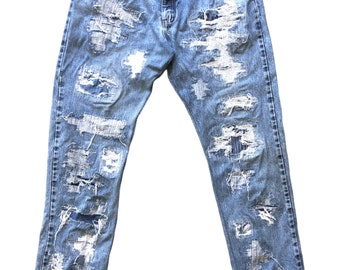 Blue rip & repair wrangler jeans