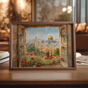 May include: A framed watercolor painting depicts a view through a window. The artwork showcases a cityscape with a golden dome, red poppies, and a blue sky. The frame is a warm brown color.