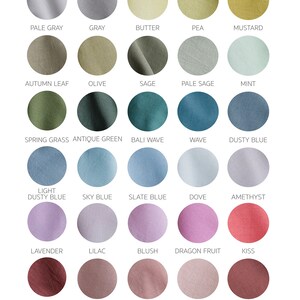 K&ouml;nnte beinhalten: Farbkarte mit 28 verschiedenen Farben von Baumwollservietten. Die Farben sind in Reihen und Spalten angeordnet, wobei jede Farbe durch einen Kreis dargestellt wird.