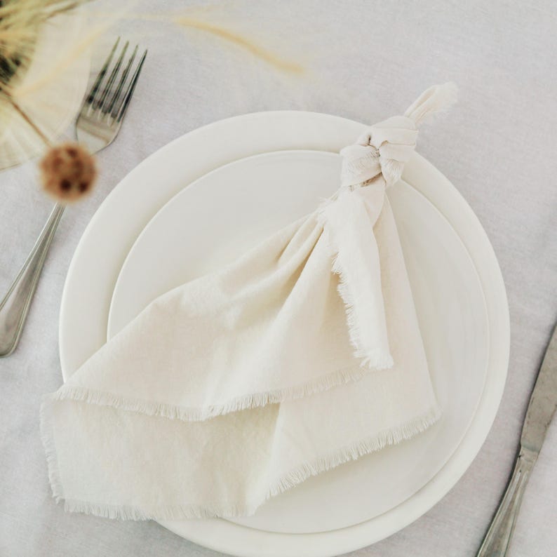 Wedding table decor featuring hand dyed cloth napkins and linens