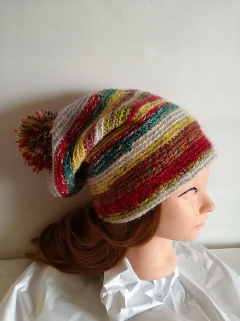 Handmade,Winter cap a multicolored for woman a birthday warm wool yarn.