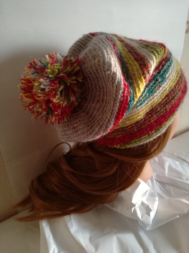 Handmade,Winter cap a multicolored for woman a birthday warm wool yarn.