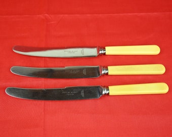 Set of Three Kendal and Dent Dinner Knives