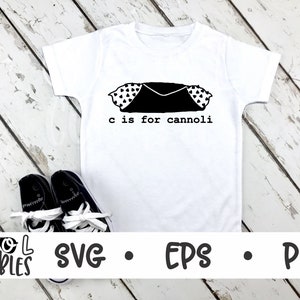 May include: A white t-shirt with a black illustration of a cannoli and the text "c is for cannoli".