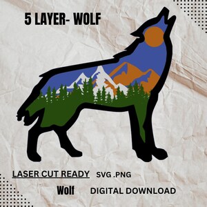 May include: A black silhouette of a wolf howling at the moon with a layered design of mountains and trees inside the wolf's body. The text "5 LAYER - WOLF" is at the top of the image. The text "LASER CUT READY SVG.PNG" is at the bottom of the image. The text "Wolf DIGITAL DOWNLOAD" is at the bottom of the image.