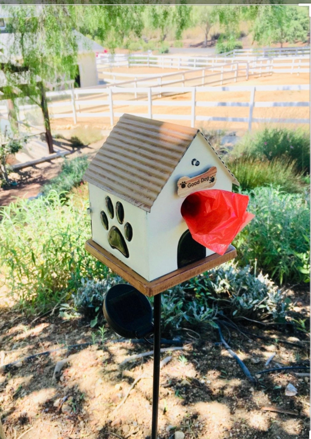 The Helping Paw Dog Bag Dispenser is a decorative dispenser. Etsy