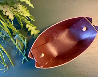 Handmade leather catch all - folded leather tray, made with italian vegetable tanned leather, and secured with small pieces of driftwood.