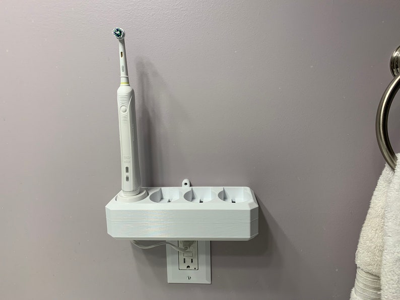 oral b toothbrush charger wall mount