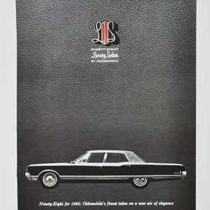 Auto-Werbung 1965 Oldsmobile 98 (allgemeines Werbungs-Broschüre altes Foto Werbeprospekt Retro Händler Autohaus 98 Neunzig Acht)