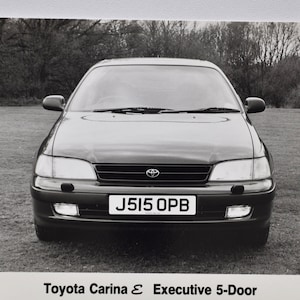 Foto Toyota Carina E (autopers foto foto autobedrijf luxe dealer dealer brochure verkoop print Japanse Executive 5-Deurs)